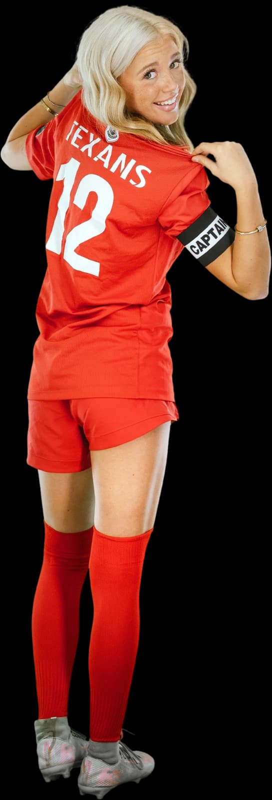 Shiah Webber showing her Texans number 12 jersey